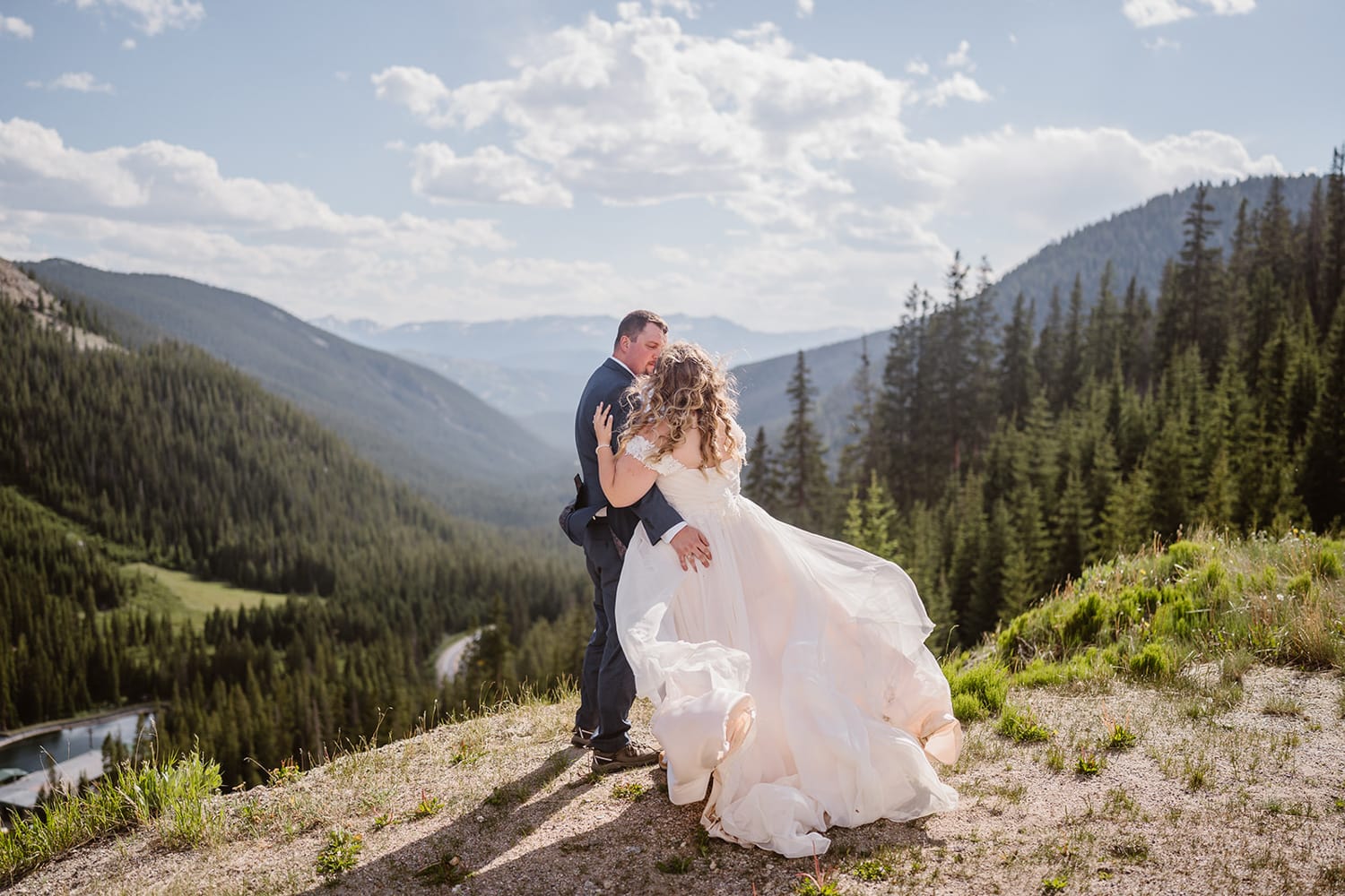 Couple standing on ridge for their Colorado elopement.