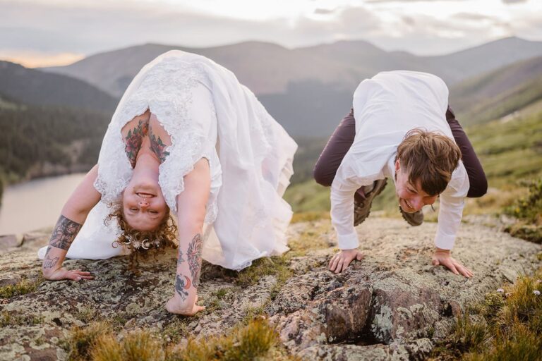 Yoga pose during elopement Bride and groom doing a yoga pose during their Colorado elopement