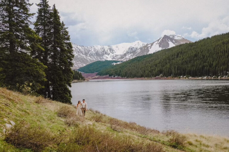 Couple hiking in the mountains during their Colorado elopement