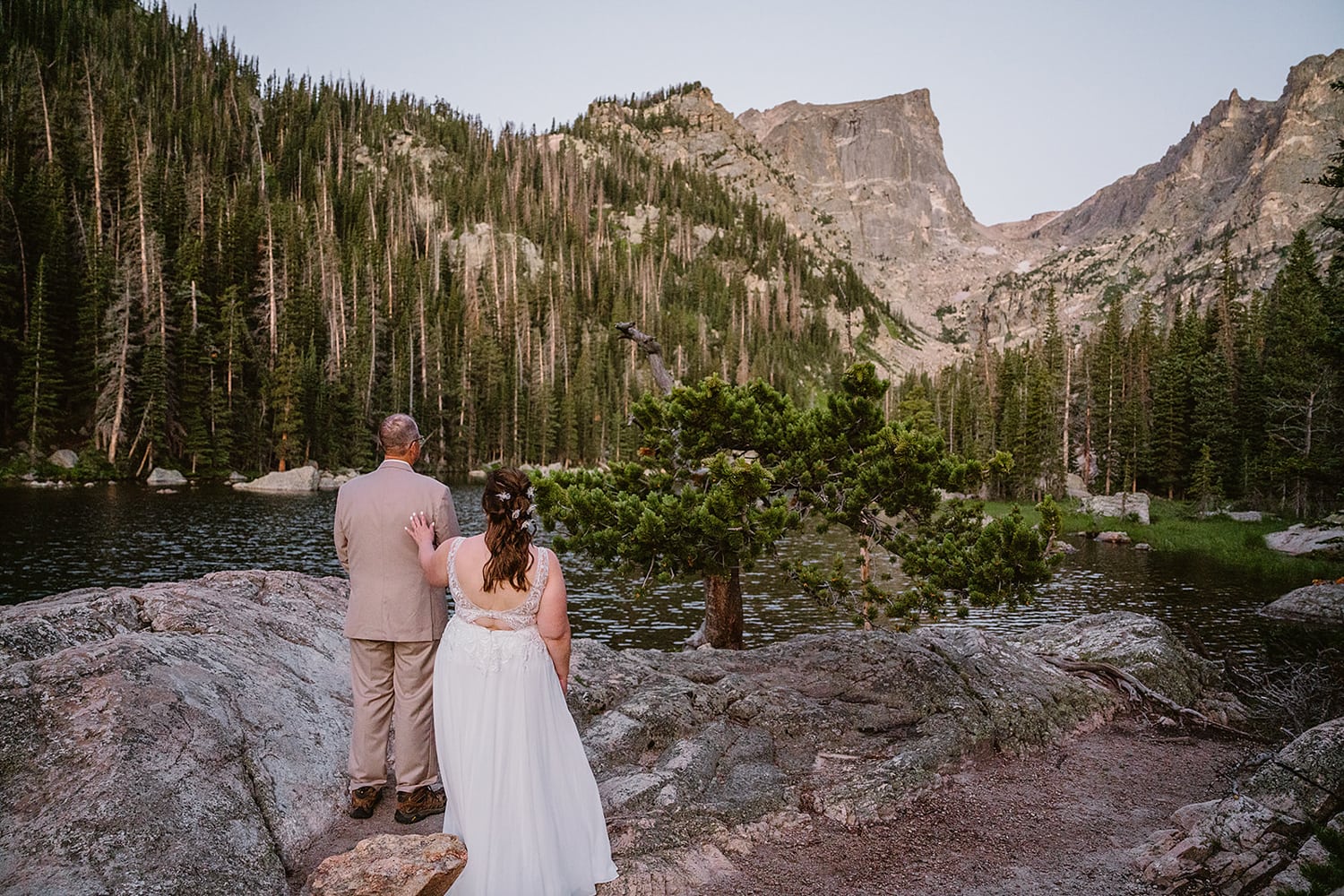 Couple sharing a first look at their Rocky Mountain National Park elopement.