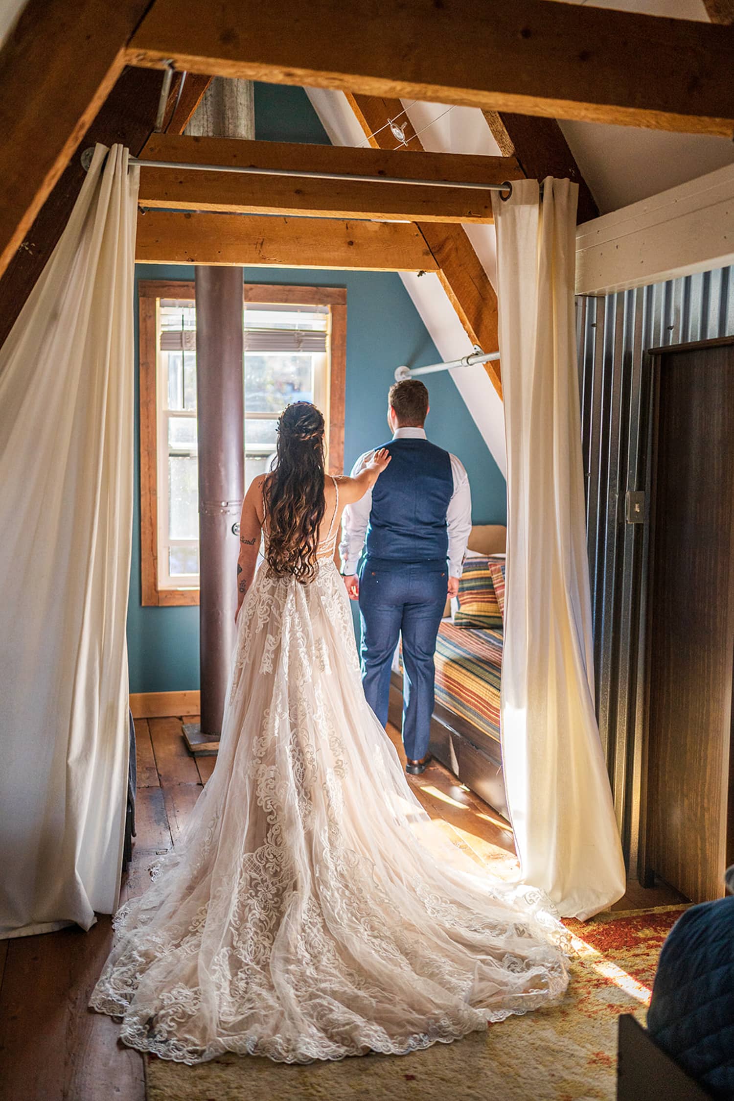 Bride and groom sharing first look at their airbnb elopement.