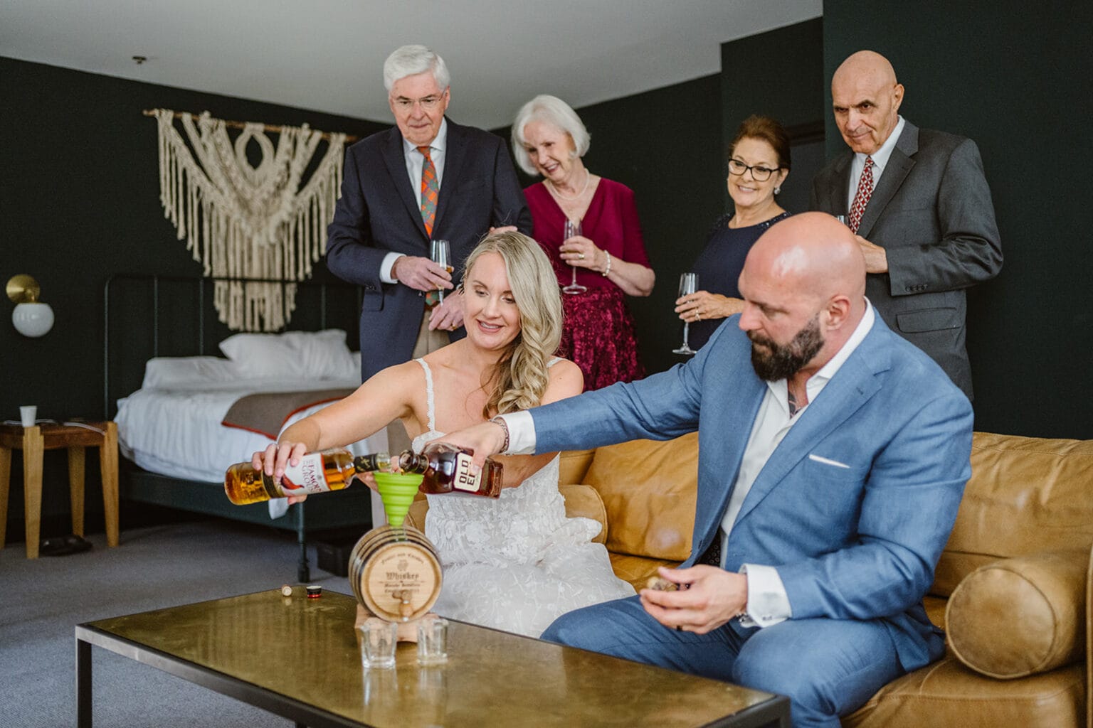 Couple blending whiskey for their elopement activity.