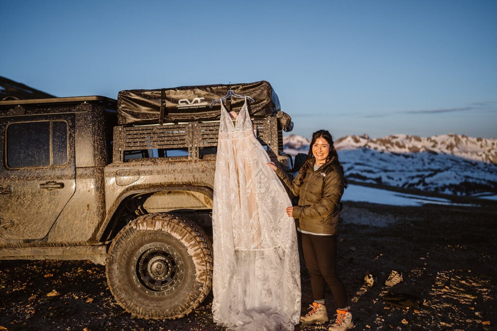 Bride getting ready for their off roading elopement.